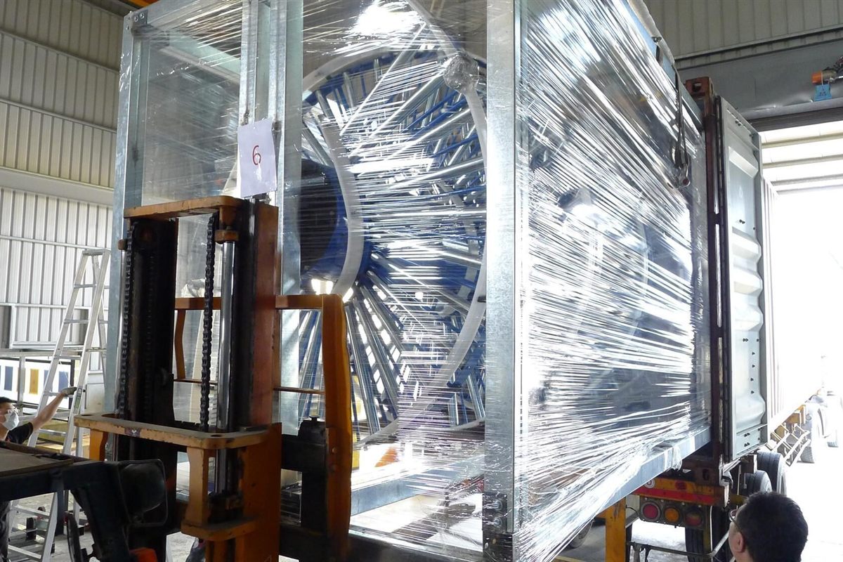 Conveyor sections packed and crated for transport.