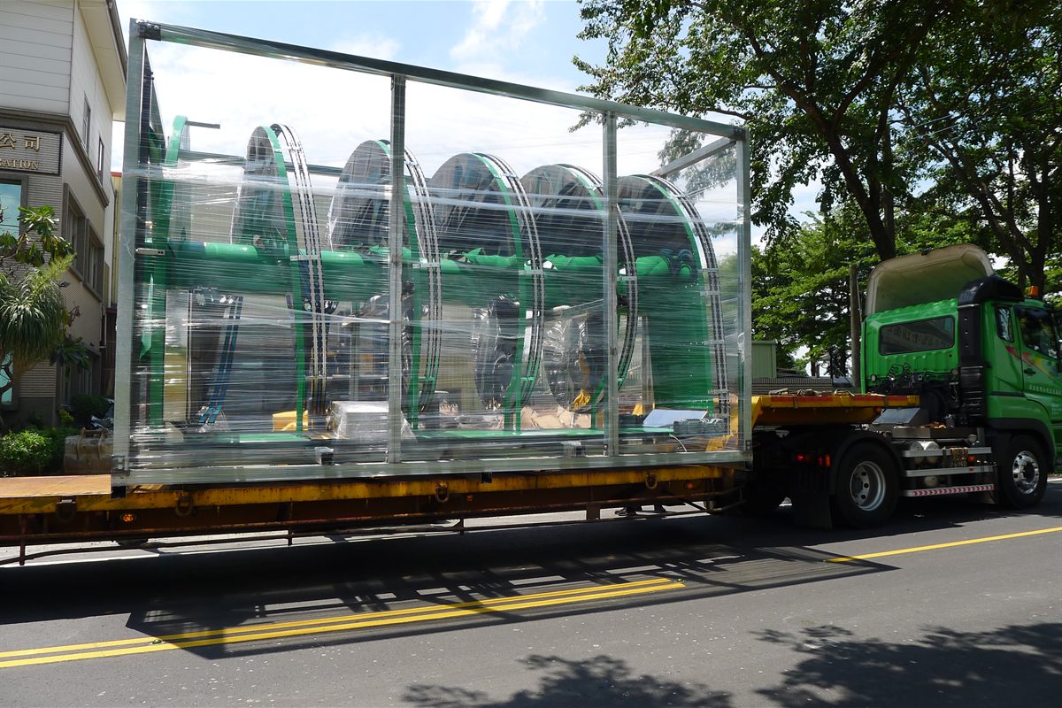 A completed NEXUS conveyor loaded onto a trailer for shipment.